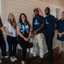 a group of people posing for a picture