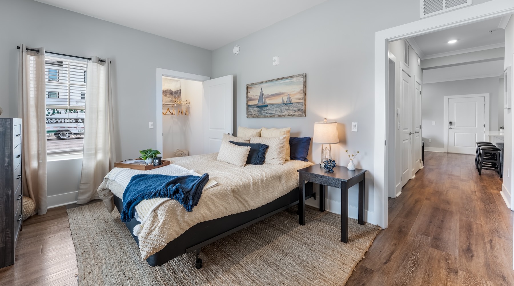 a bedroom with a bed and a closet
