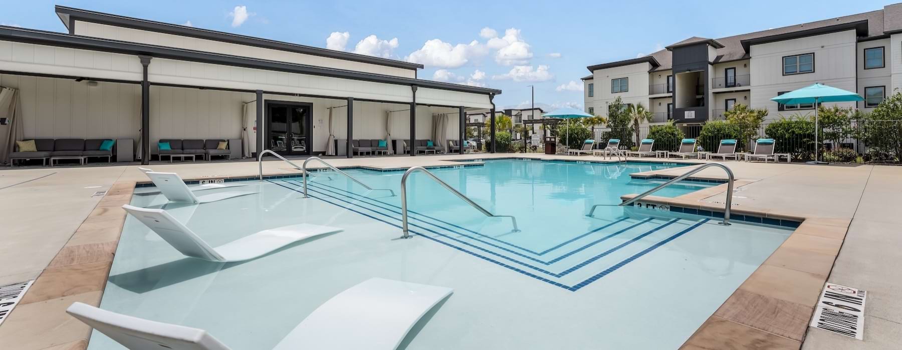 a swimming pool outside of a building
