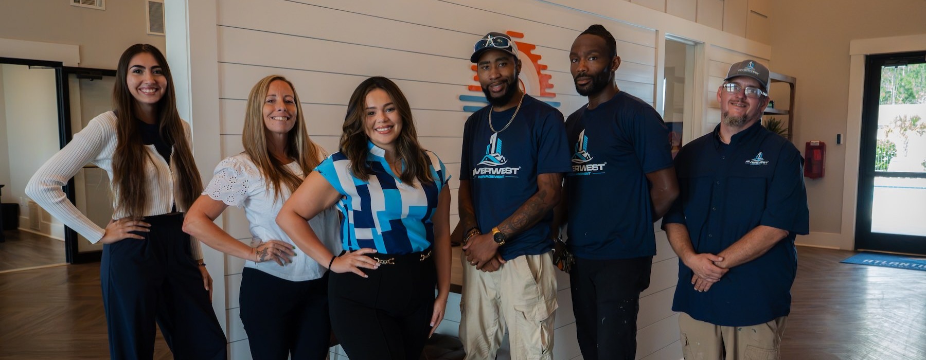 a group of people posing for a photo