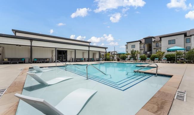 a swimming pool outside of a building